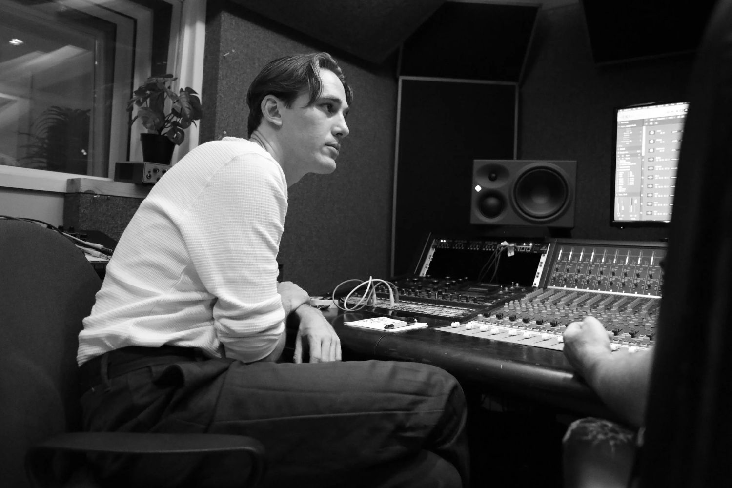 Guy Jones at a mixing desk in the studio